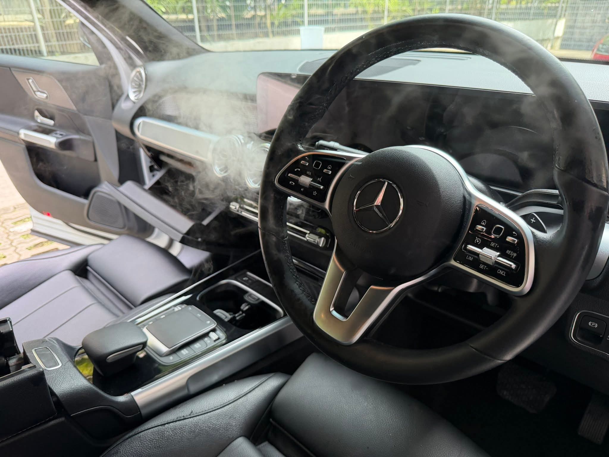MIRAKN dry gas fumigation treatment in progress inside a Mercedes GLB180